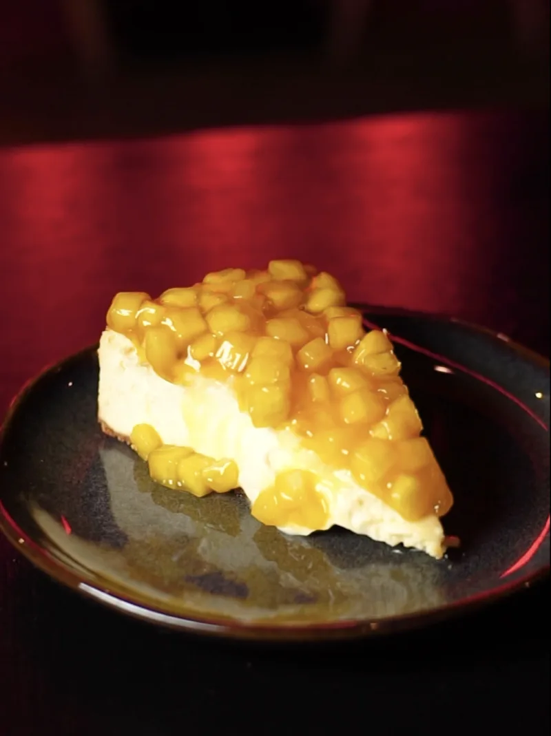 Tarta de queso de mango y maracuyá de Vulcano Grill